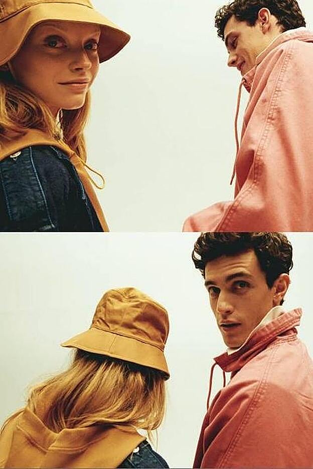 Ella lleva sudadera con capucha de Max Mara, gabardina vaquera de Hugo y gorro de Hermès. Él, chaqueta de Levi’s y polo de Loewe.