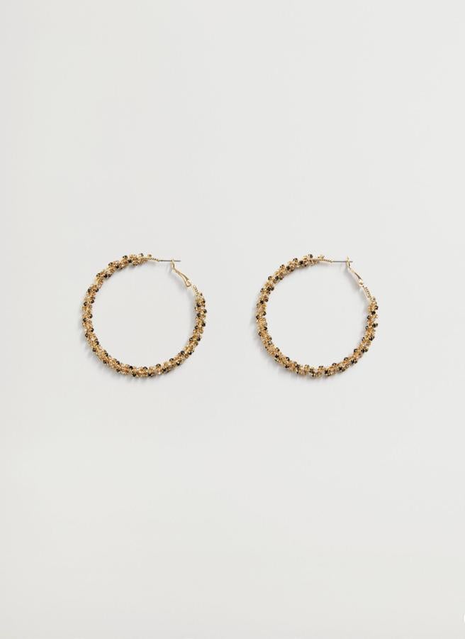 De acero inoxidable, estos pendientes de aro con cristales y abalorios tienen un precio rebajado de 4,49 euros (antes 12,99 euros).