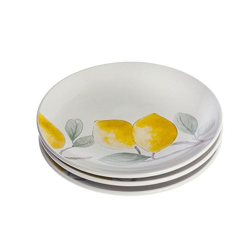 Pack de 3 platos (14,99 €) con estampado de limones. Se puede completar la colección con tazas y cuencos a juego. 