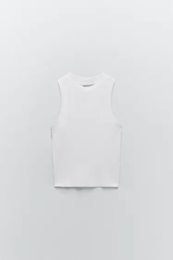 Camiseta de cuello halter con acabados en rib, color blanco.