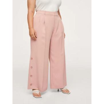 Imagen secundaria 1 - Pantalones de pinzas, anchos y rosas: el truco low cost de Mary de Dinamarca para rejuvenecer un look que tienes que copiar