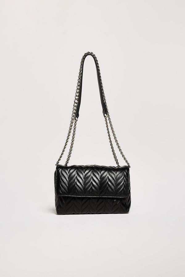 Bolso bandolera con asa combinada (9,99 euros).