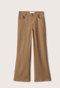 Imagen secundaria 2 - 1. Los tonos tierra son los protagonistas de este sencillo look de otoño. Una combinación simple pero completamente efectiva para el día a día. 2. Americana con estampado de cuadros en tonos marrones de Mango (59,99 euros). 3. Pantalón en color tabaco con corte  flare  de Mango (29,99 euros)