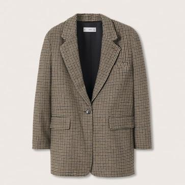 Imagen secundaria 1 - 1. Los tonos tierra son los protagonistas de este sencillo look de otoño. Una combinación simple pero completamente efectiva para el día a día. 2. Americana con estampado de cuadros en tonos marrones de Mango (59,99 euros). 3. Pantalón en color tabaco con corte  flare  de Mango (29,99 euros)