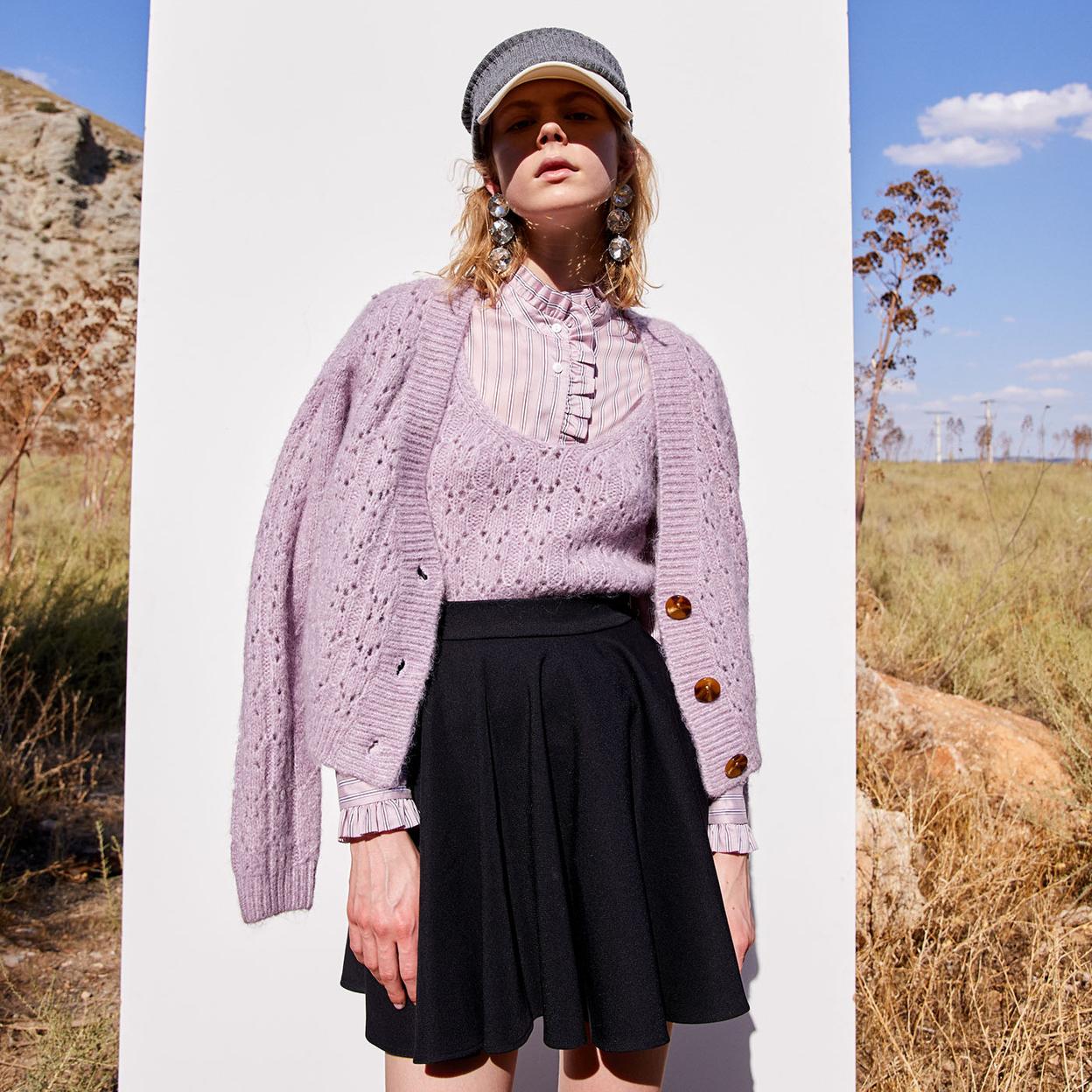 El conjunto de punto de Sfera que además de ser precioso nos enseña el mejor truco para sacarle partido a nuestros tops en otoño