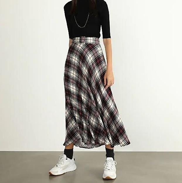 Imagen principal - Falda midi de cuadros, el truco de las royals para conseguir un look perfecto que hemos encontrado baratísimo en El Corte Inglés y Mango