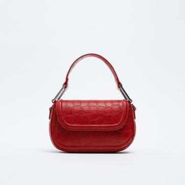 Imagen secundaria 1 - 1. Bolso de mano en color azul lavanda de Zara. 2. Bolso de mano con piel grabada de color rojo de Zara. 3. Bolsos de ante para llevar en bandolera de Zara. 