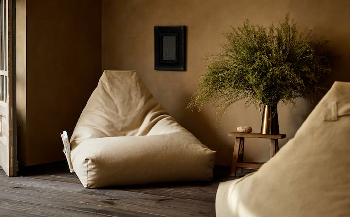 Este puff súper cómodo que pondrá una nota confortable a tu salón o dormitorio. Precio rebajado en Zara Home: 59.99 euros.