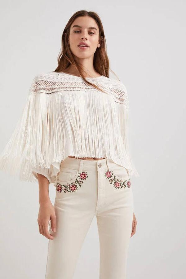 Esta blusa de Desigual cuenta con encaje en la parte superior