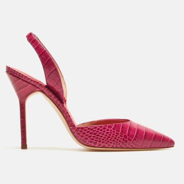 Imagen secundaria 1 - La reina Letizia presume de tipazo con un bonito vestido midi estampado que puedes comprar en el Mango