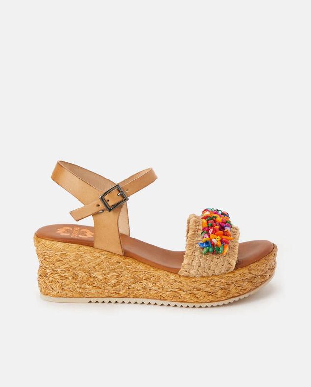 Nuestras favoritas son estas de Porronet que han sido confeccionadas con piel y material textil.  Cómpralo aquí