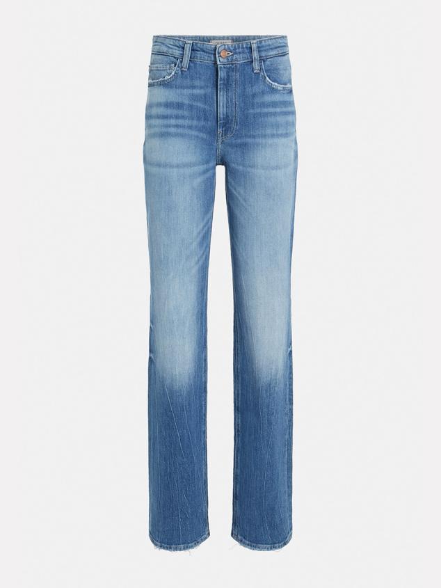 Vaqueros de algodón elastico, diseñado en corte regular. Con talle alto de pernera recta. Son de Guess. Precio: 59 €. 