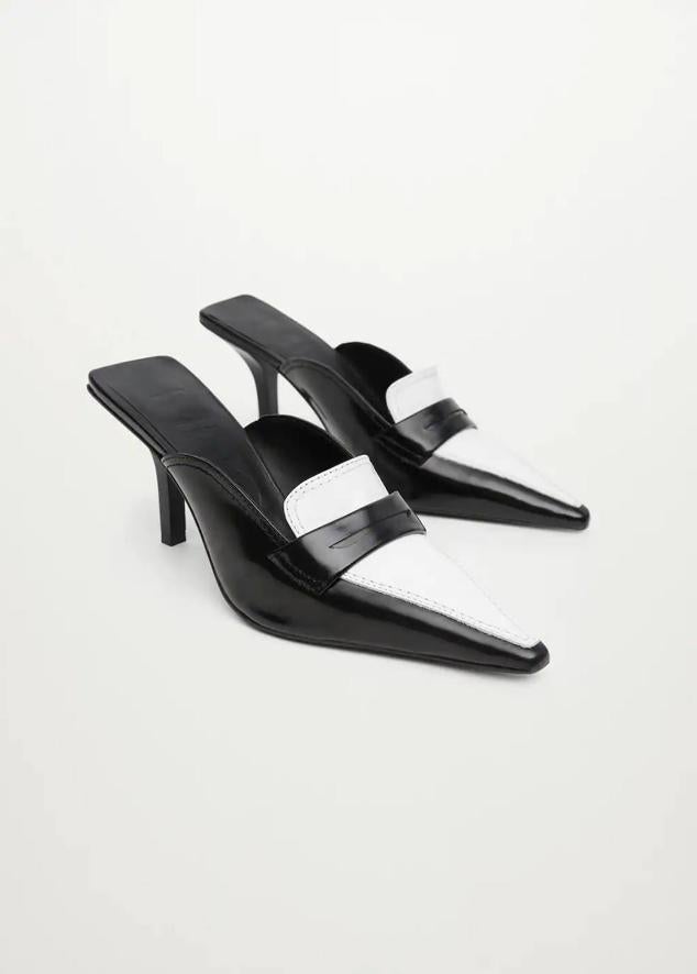 Estos de Mango en negro y con detalles en blanco han sido confeccionados con piel de bovino.