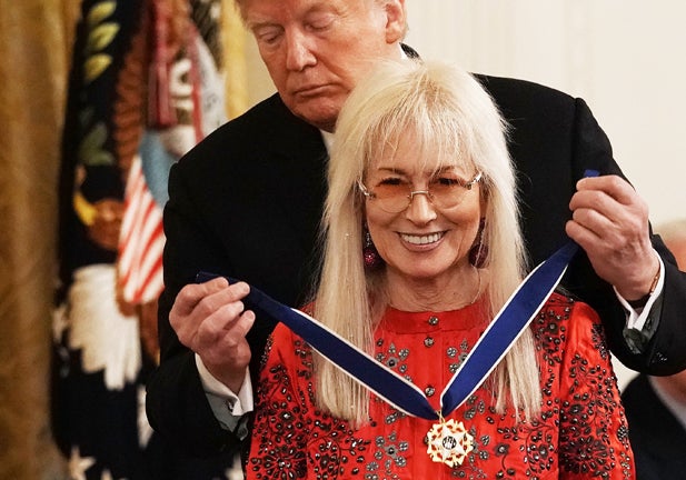 WASHINGTON, DC - NOVEMBER 16:  U.S. President Donald Trump (L) presents the Presidential Medal of Freedom to physician Miriam Adelson (R), wife of Sheldon Adelson, during an East Room ceremony November 16, 2018 in Washington, DC. The award is the the nationÕs highest civilian honor that present to individuals who have made significant contributions to the United States of America.  (Photo by Alex Wong/Getty Images)