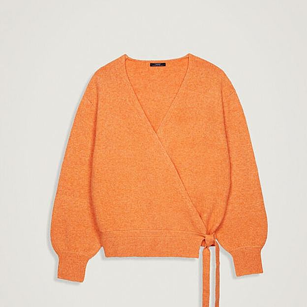 Cárdigan de punto de color naranja de Parfois.