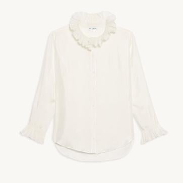 Imagen secundaria 1 - Tanto el traje negro (blazer 325 euros y pantalón 195 euros) como la camisa (225 euros) de Tamara eran de Sandro.