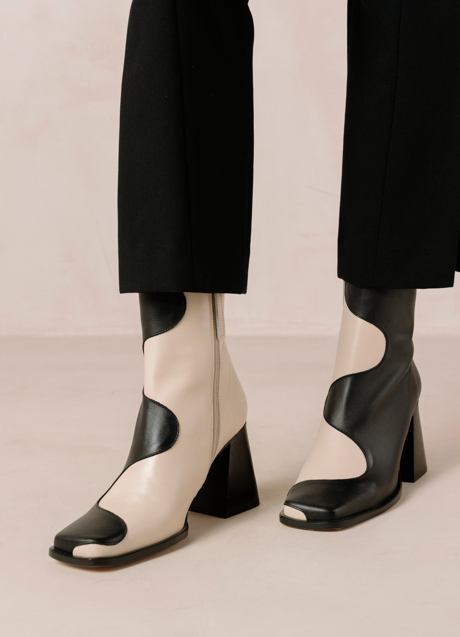 Imagen - Botines de cuero blanco y negro de Alohas, 238€.