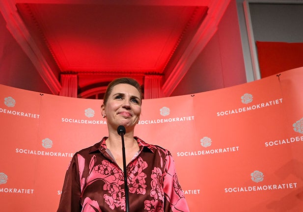 Denmark's Prime Minister and leader of the Social Democratic Party Mette Frederiksen smiles as she speaks at the Social Democratic Party location in Christiansborg in Copenhagen, Denmark, early on November 2, 2022. - Denmark's Social Democrat Prime Minister Mette Frederiksen clung to power in the November 1 general election after the country's left-wing bloc won a one-seat majority, final results showed. (Photo by Jonathan NACKSTRAND / AFP) (Photo by JONATHAN NACKSTRAND/AFP via Getty Images)