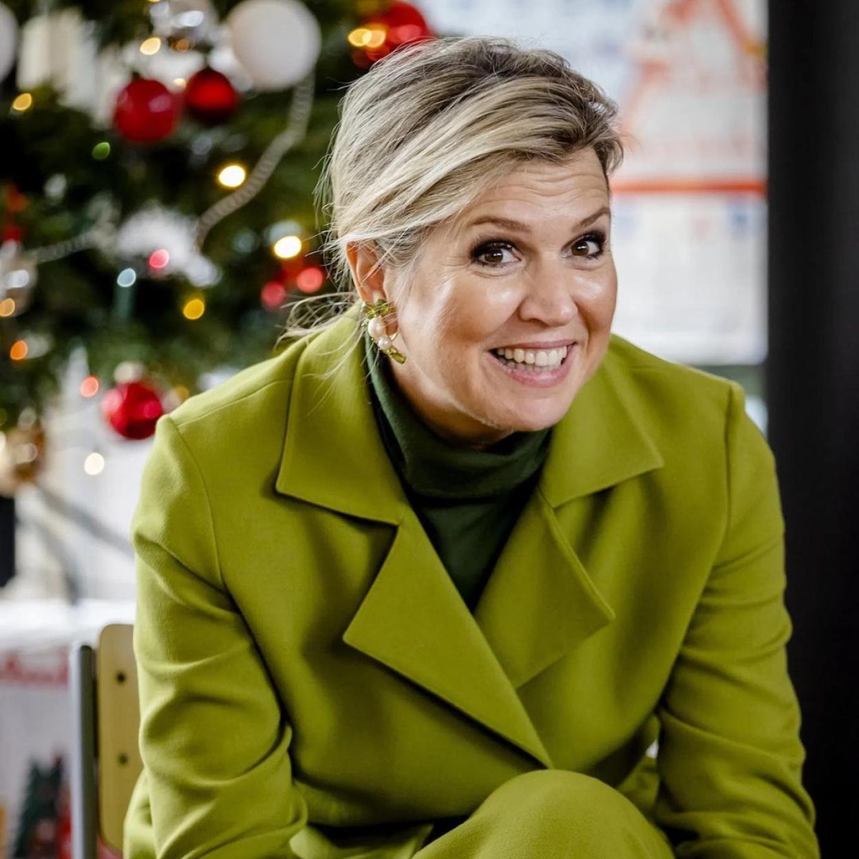 La reina Máxima de Holanda con abrigo verde.