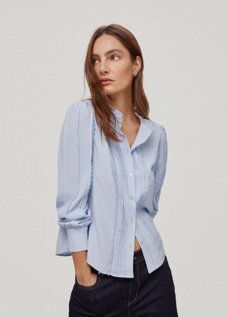 Imagen - Blusa celeste con manga abullonada