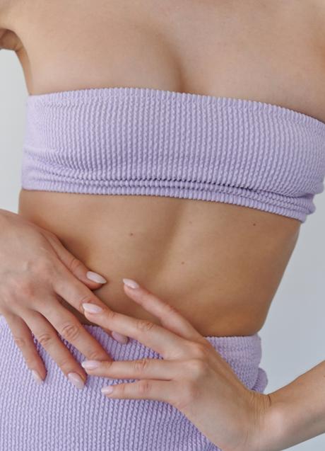 Imagen - Mujer con abdominales marcados/PEXELS