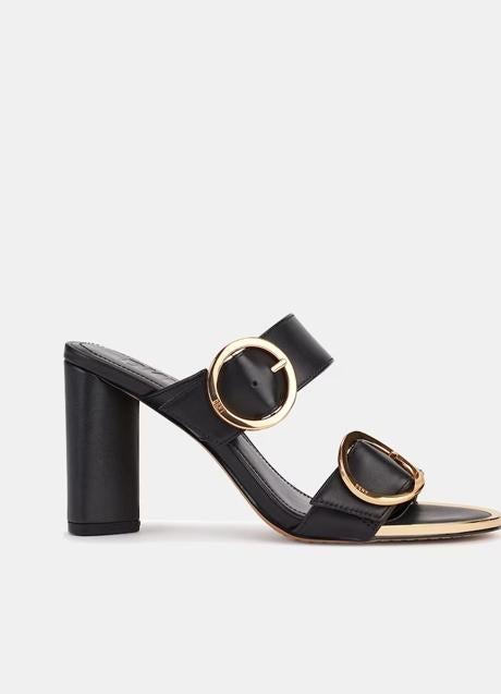 Imagen - Mules negros con hebillas de DKNY, 89,60 euros.