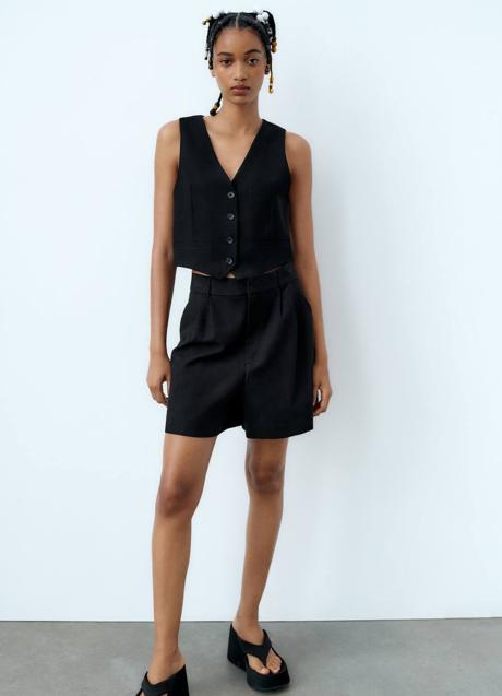 Imagen - Traje negro con chaleco y bermudas