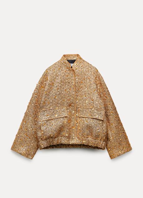 Imagen - Chaqueta bomber de lentejuelas en dorado de Zara. Foto: Zara.