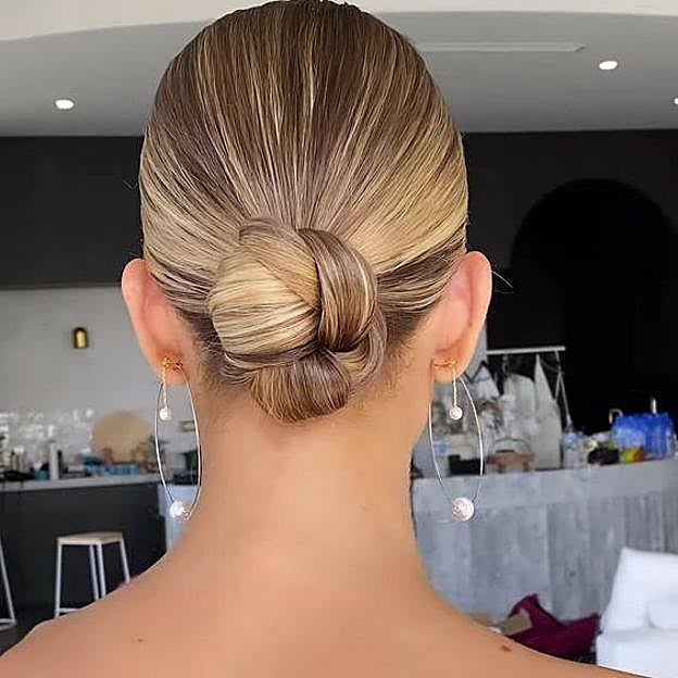 Peinado balletcore con moño trenzado