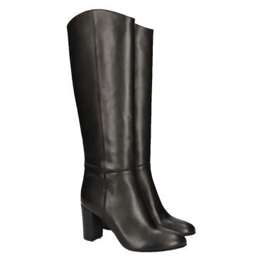 Imagen secundaria 1 - Arriba, botas de Loewe. Abajo a la izquierda, botas de Mascaró y a la derecha, de Calvin Klein.