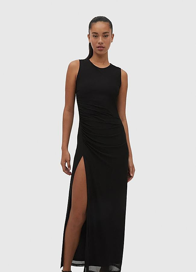 Imagen - Vestido midi cruzado en tul de Stradivarius (29,99 euros). Foto: Stradivarius.
