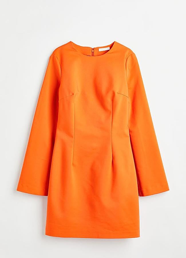 Imagen - Vestido entallado en color naranja de H&M.