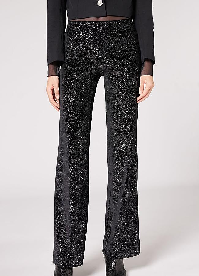 Imagen - Pantalones con brillo de Calzedonia (19,90 euros).