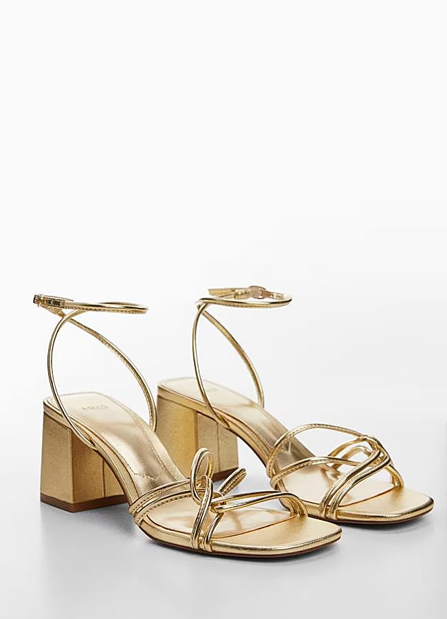 Imagen - Sandalia de tacón cuadrado en dorado de Mango (35,99 euros).