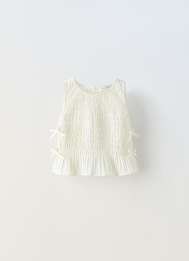 Imagen - Blusa con lazos laterales de Zara Kids.