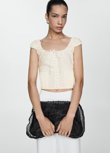 Imagen - Top blanco de Mango (22,99 euros)