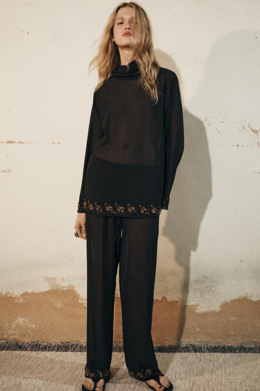Imagen - Top transparente con abalorios de Zara.