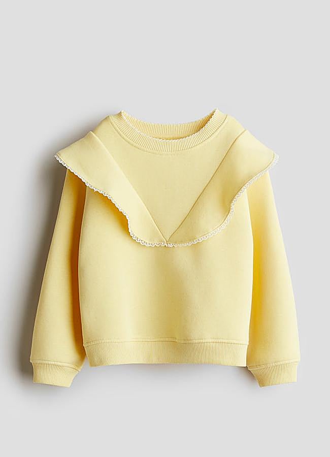 Imagen - Sudadera amarilla con volantes de H&M.