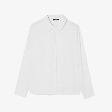 Imagen secundaria 1 - Sudadera con capucha loose fit de H&M (25,99€)/ Camisa manga larga con botones de Parfois (25,99€)/ Pantalón wide leg tailoring de Bershka (25,99€)