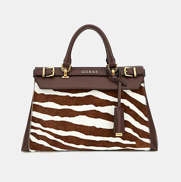 Imagen principal - Bolso Sestri Luxury de Guess (195€ en El Corte Inglés)/ Botines de tacón con estampado animal de Parfois (39,99€)/ Vestido estamapdo animal print de Lola Casademunt (149€)