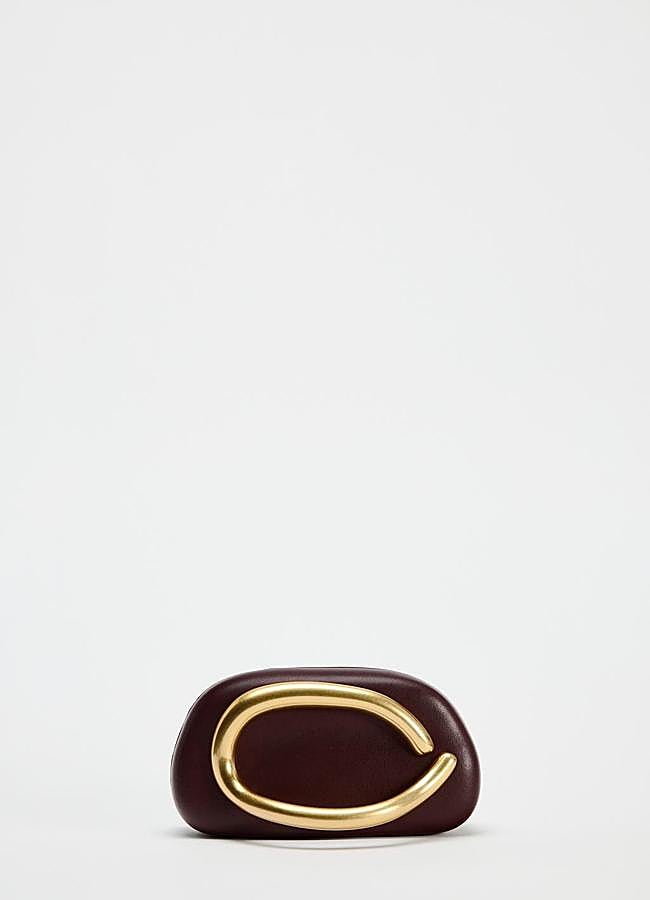 Imagen - Bolso caja marrón y dorado de Zara, 39,95 euros.