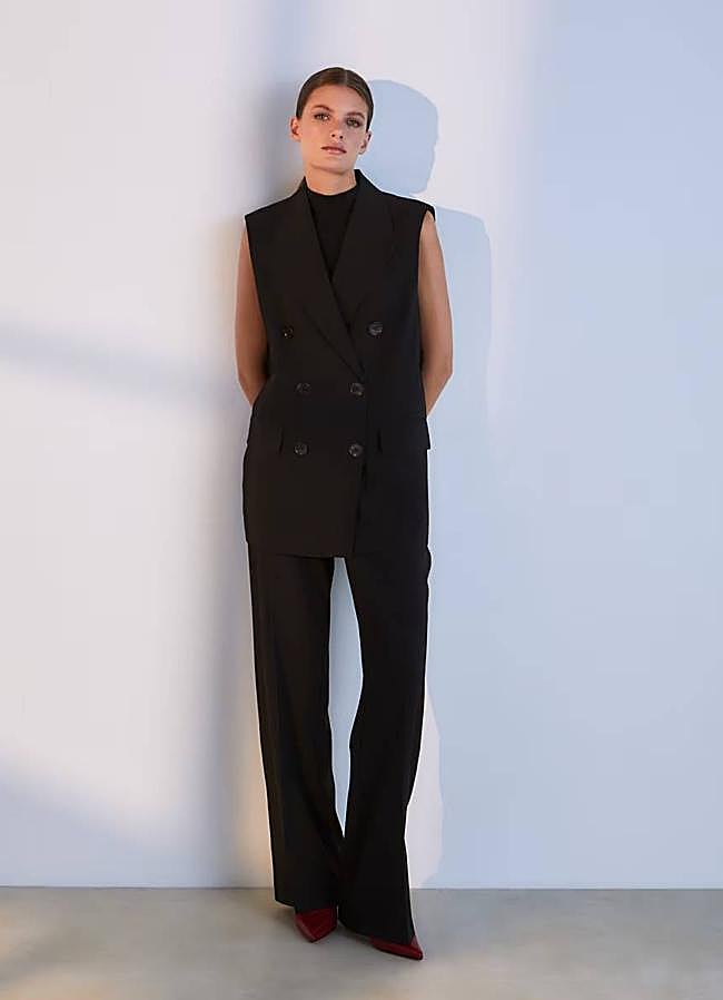 Imagen - Traje de Woman El Corte Inglés (Chaleco de vestir cruzado de mujer por 69,99€/ Pantalón de vestir de mujer con cremallera en costado por 45,99€)