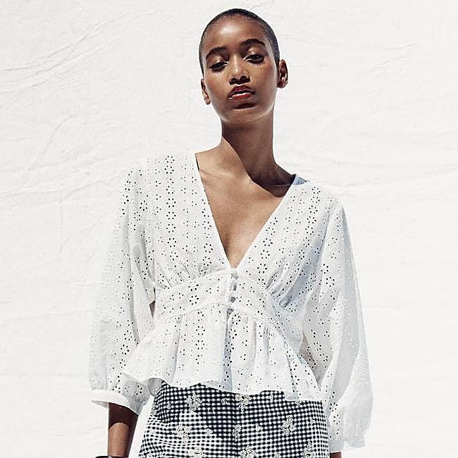 Camisa bordados perforados (25,95€)