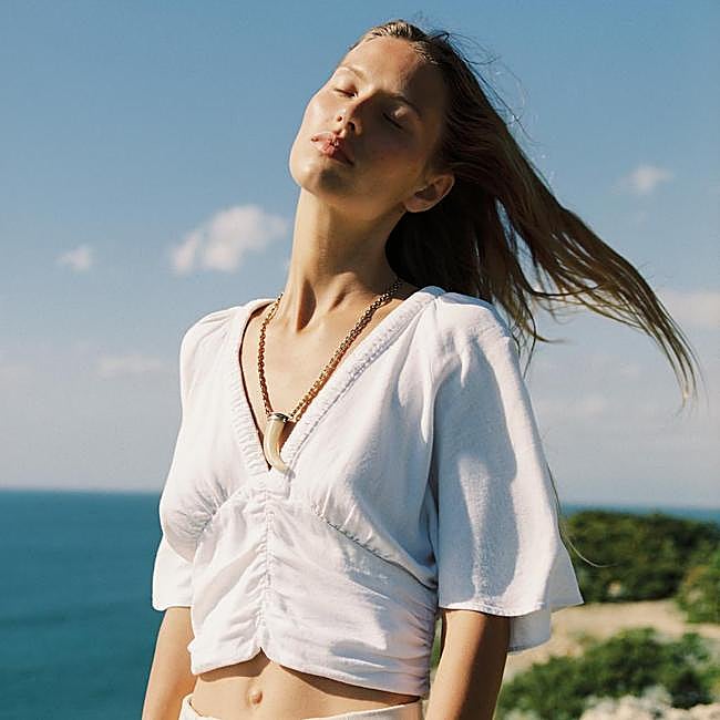 Blusa manga volante con luno