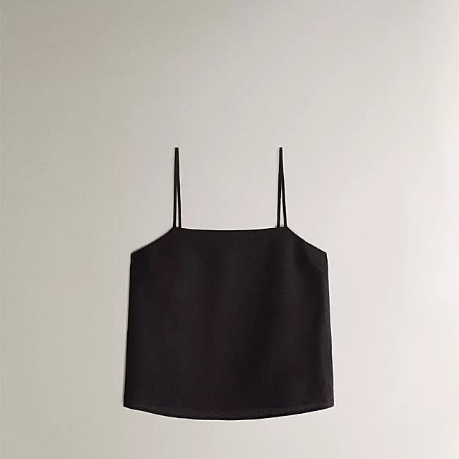 Top de lino en negro con tirantes finos de Zara Home.