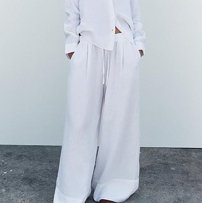 Pantalones palazzo anchos de lino blanco