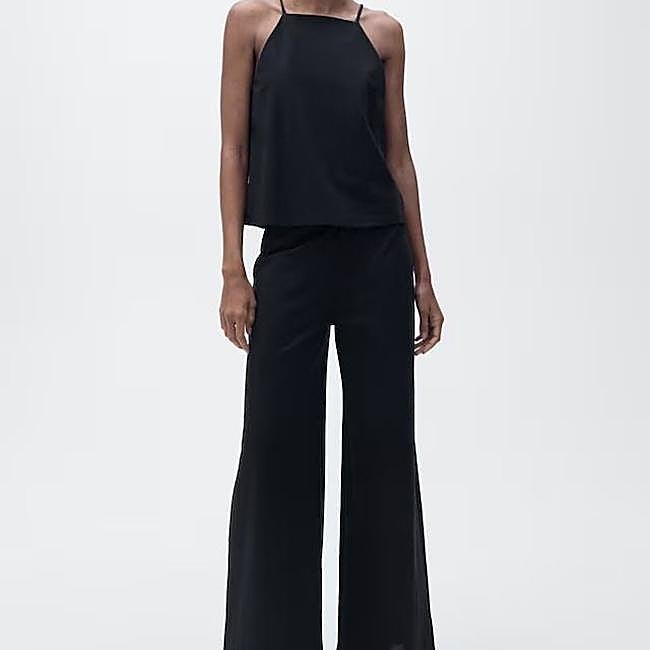 Look negro con top y pantalones largos