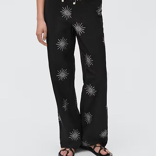 Pantalón fluido con estampado bicolor