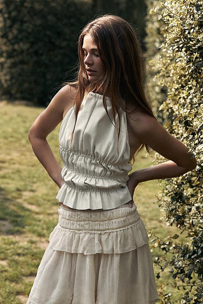 Top fruncido de piel.