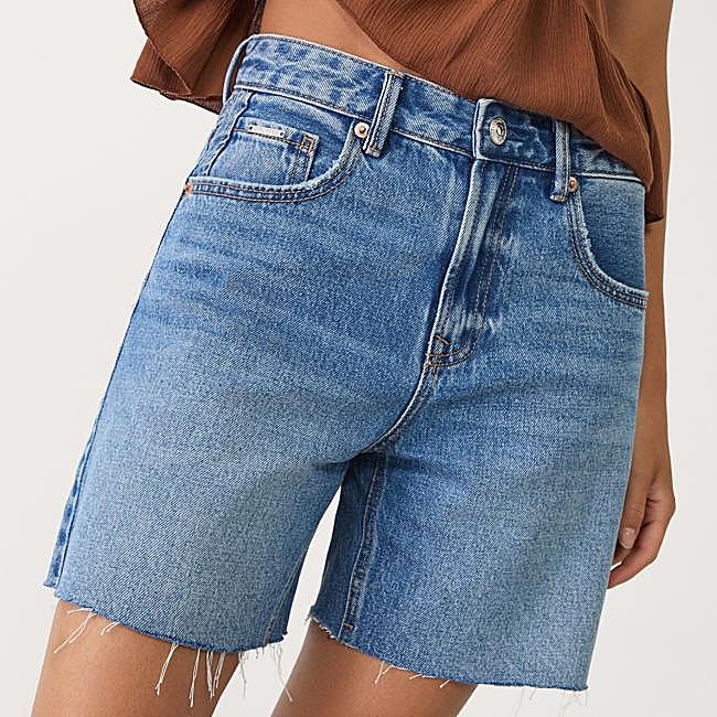 Shorts vaqueros con bajo desflecado